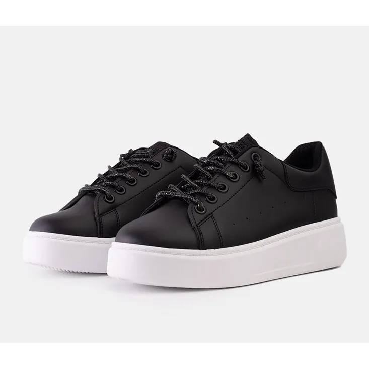 Black sneakers with eye-catching Asmait decoration