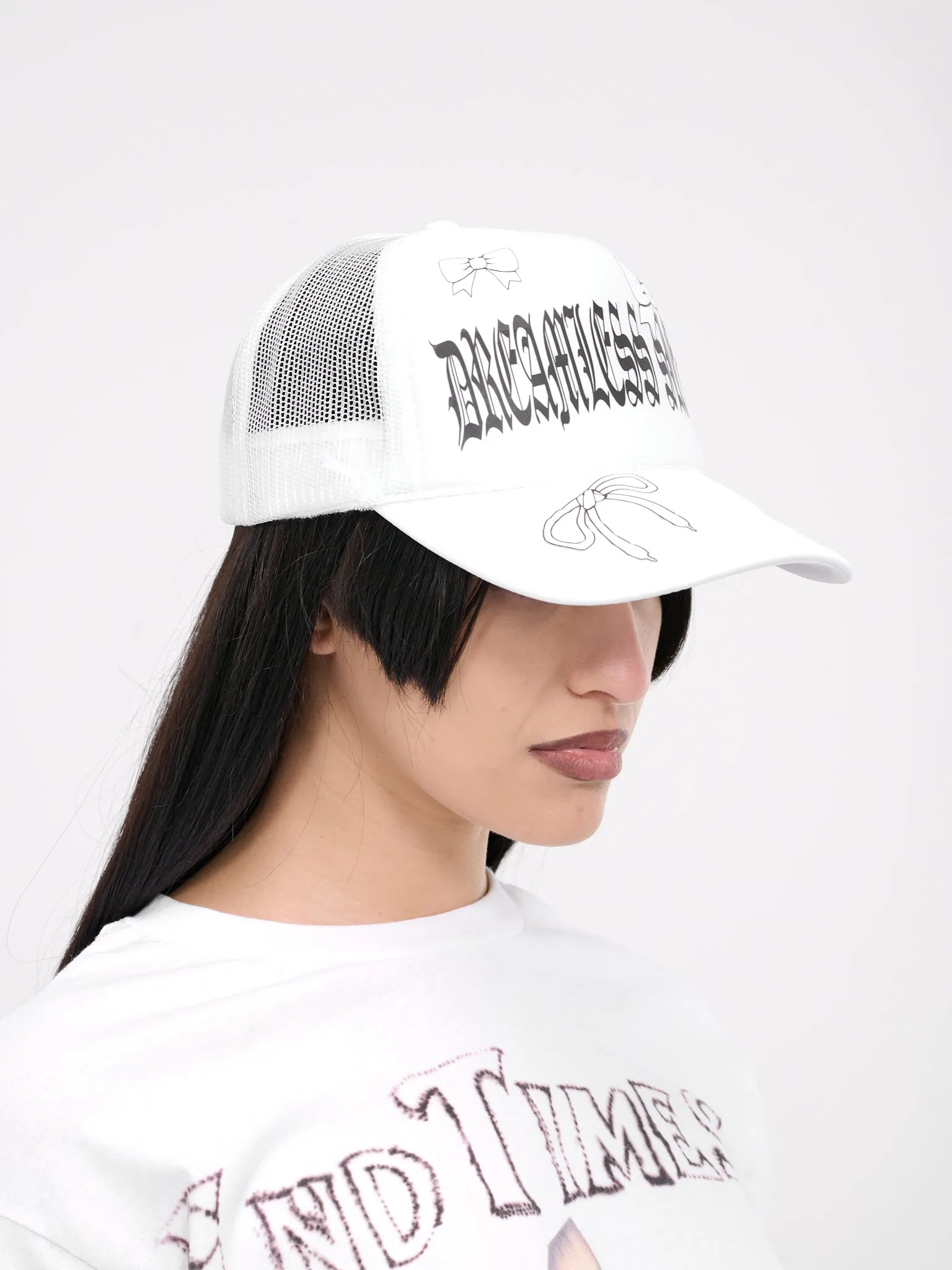 Dreamless Trucker Hat (142-BLACK-FONT-WHITE-BOWS)